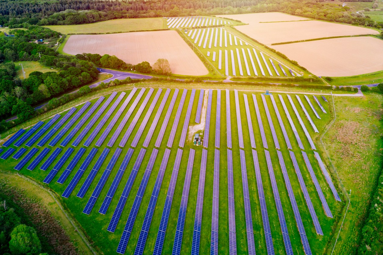 Vast solar panels in agricultural landscape in Indore, India | LUMENS ELECTRICALS